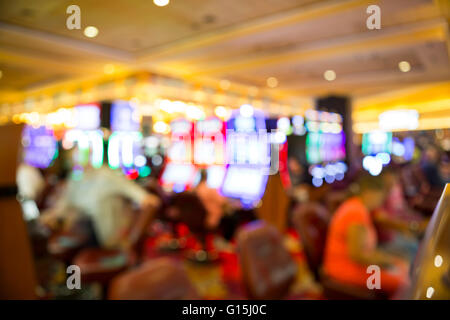 Defocused casino slot machine blur with colorful lights Stock Photo - Alamy