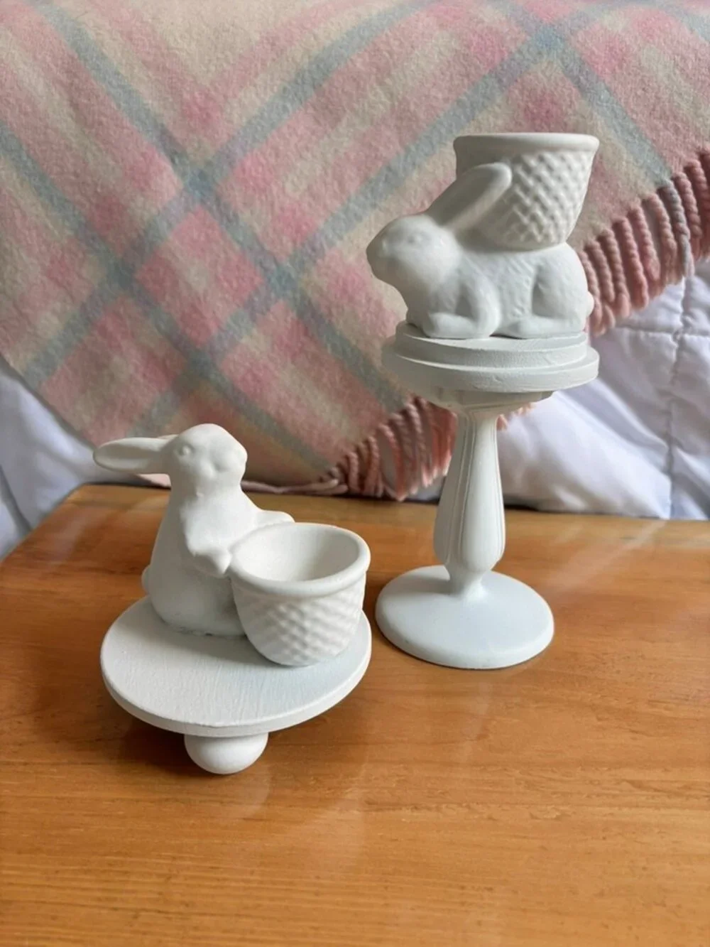 Set of Thrift flip ceramic Easter Bunny egg holders on pedestals