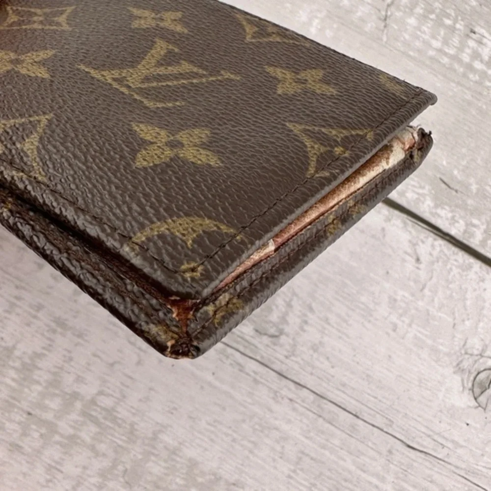 AUTHENTIC Louis Vuitton Monogram Multiple Wallet. Monogram brown.